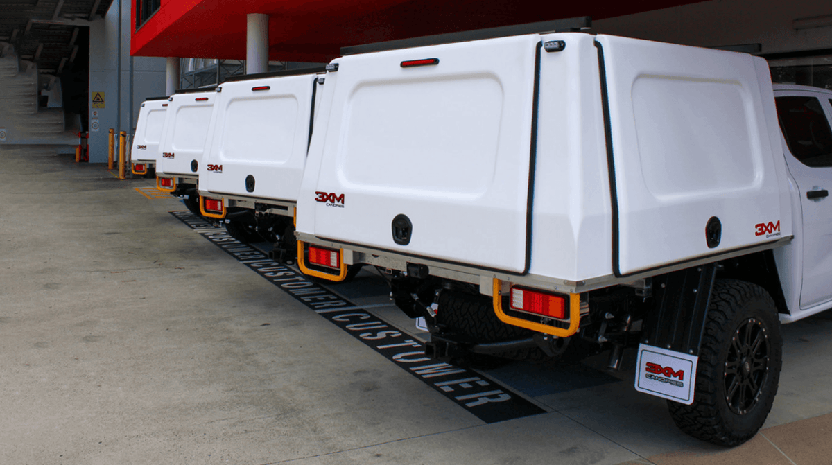 4 UTE with canopy parked in parking lot